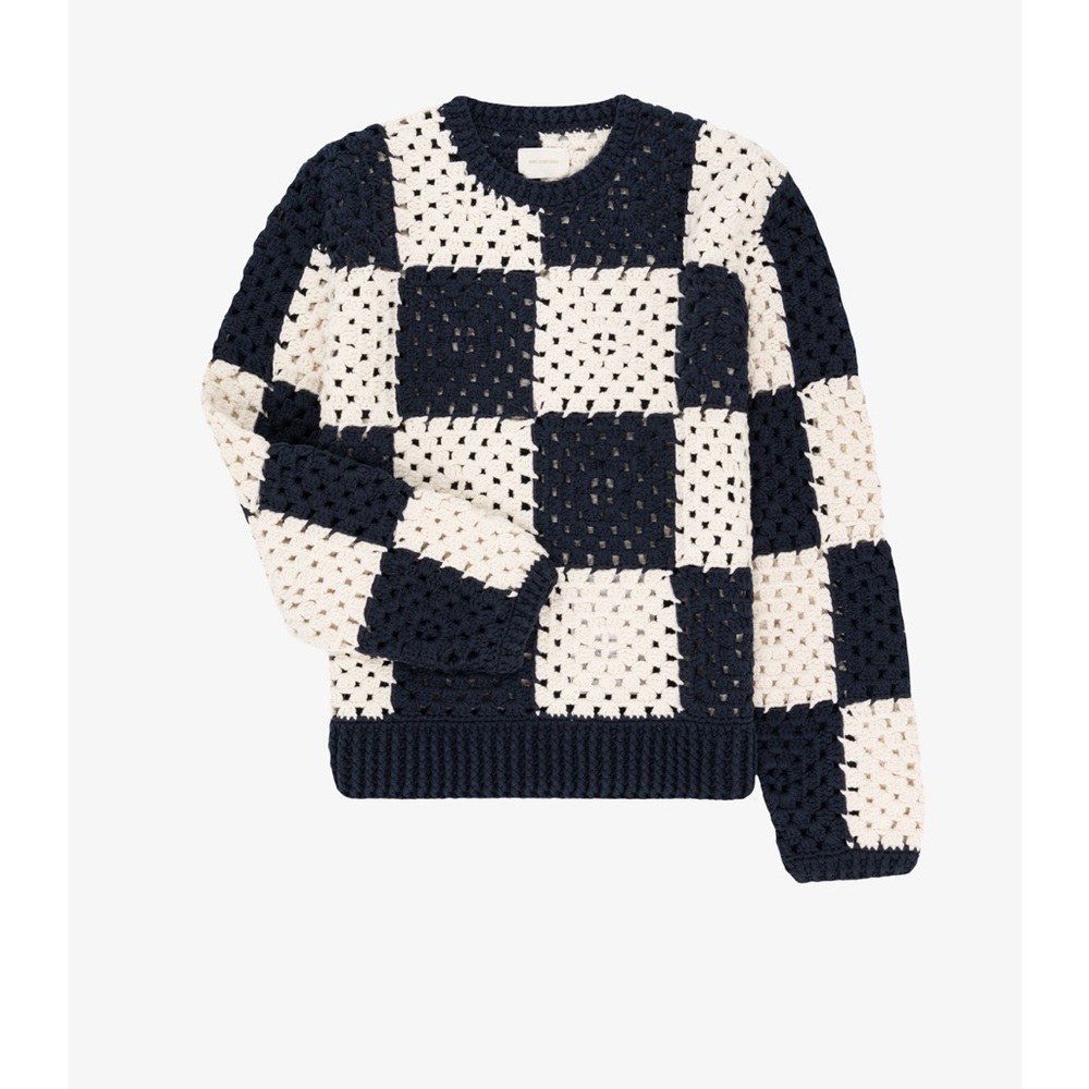 This is the crochet sweater from the spring 2024 Aimé Leon Dore collection.